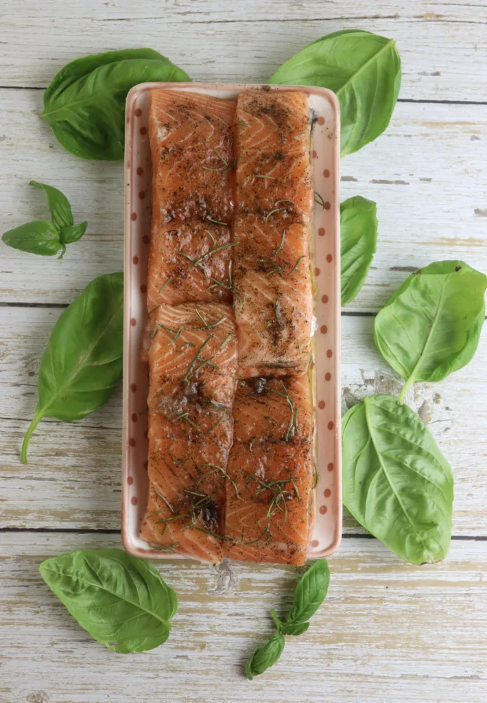 salmon fillets, spiced and sprinkled with dried rosemary